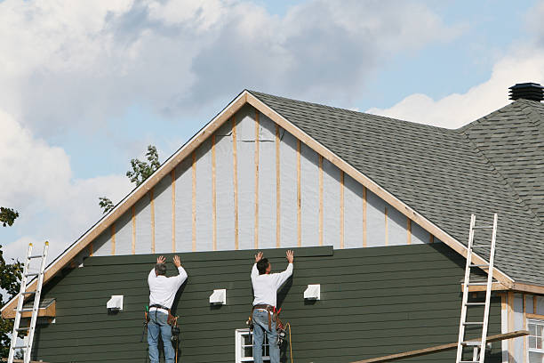 Professional Siding technician working in Wilmington, MA